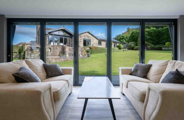 Still image taken from a home video of a seating area and the view out of the window.