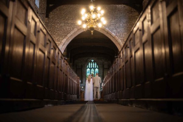 A still image of a husband and wife from a video created by a professional wedding videographer.